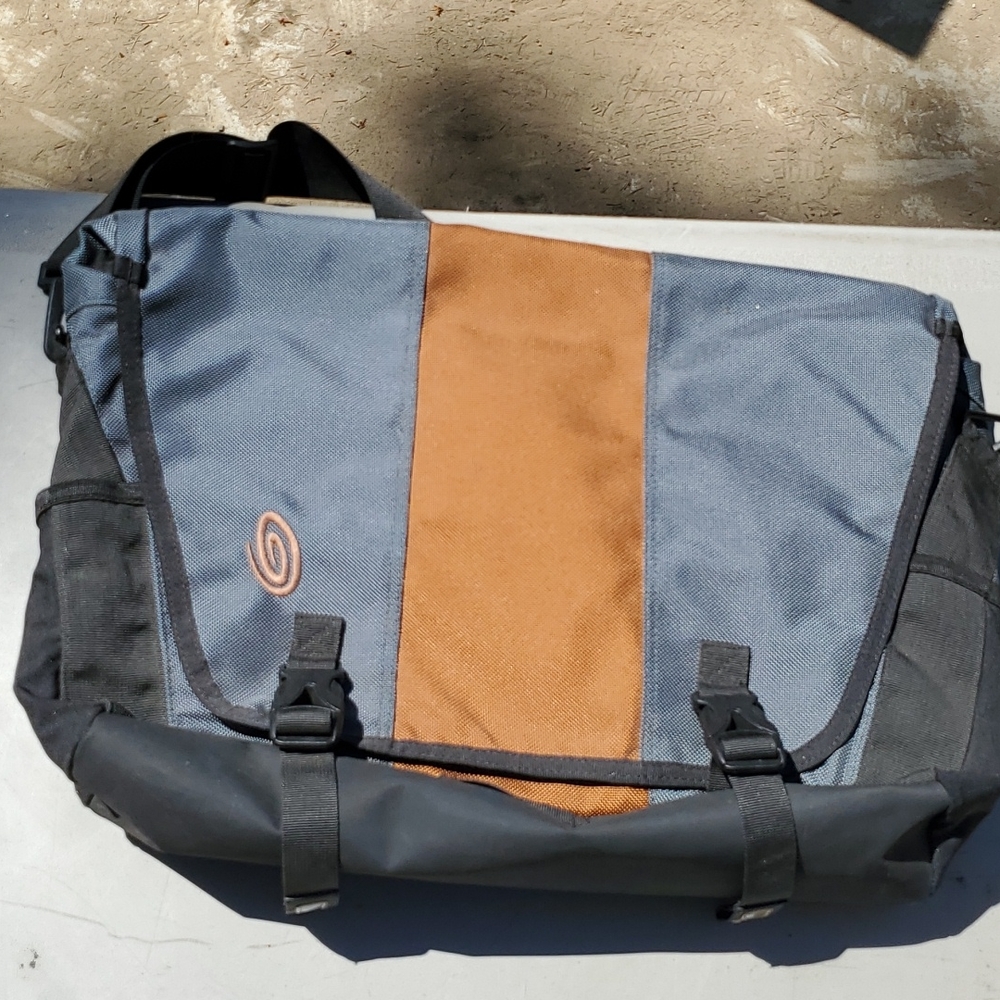 Timbk2 computer messanger bag. Blue with brown . Shoulder strap.